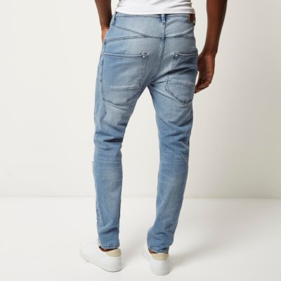 Light blue wash ripped Chester tapered jeans